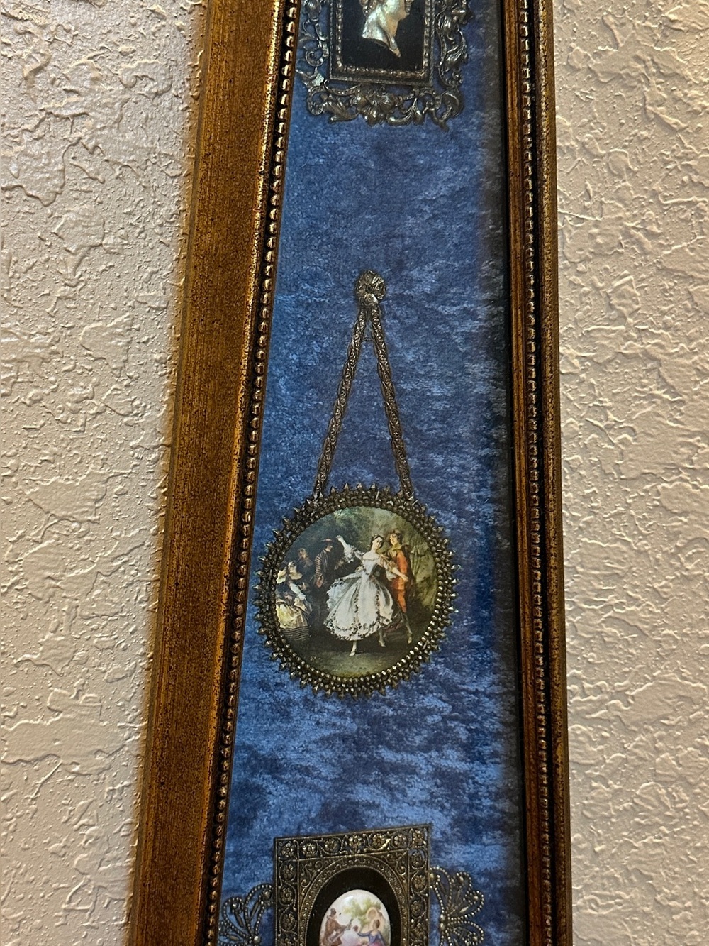 Vintage, trapezoid-shaped wooden shadow box wall plaque featuring porcelain